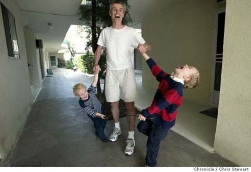 A photo of Colin Wood and his children, taken by Chris Stewart. Oct 19th 2003.
